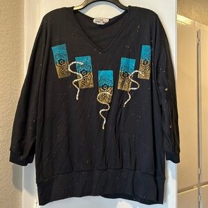 80s style retro three-quarter length sleeve v-neck deco shirt